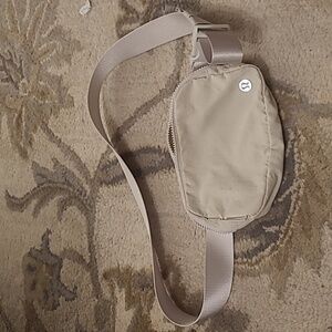 Cream Lululemon belt bag